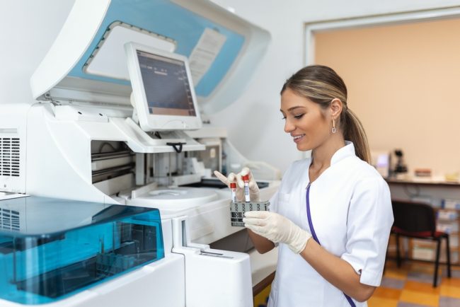 Female,Scientist,Working,In,The,Lab,,Using,Computer,Screen